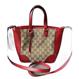 Borsa Gucci Guccissima in pelle rossa e tela GG beige
