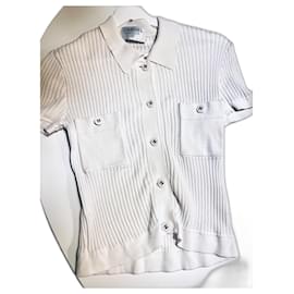 Polo Chanel de algodón blanco con botones logo CC