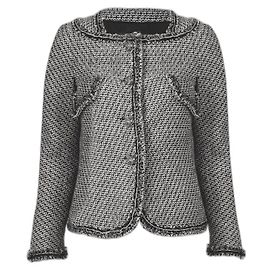 Giacca Chanel in tweed nero e grigio
