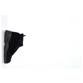 Botines con cremallera Miu Miu en ante negro