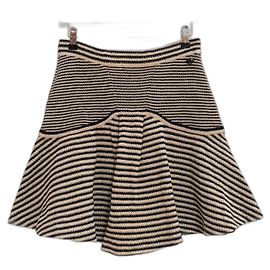 Falda acampanada de punto de papel/algodón/seda de Chanel Resort 2015