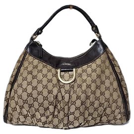 Borsa hobo Gucci GG in tela e pelle D Ring Beige/Marrone