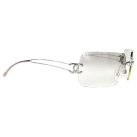 Lunettes de soleil Chanel CC Logo argentées à monture transparente sans cerclage 4068