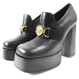 Pumps in pelle metallica con piattaforma Medusa di Versace
