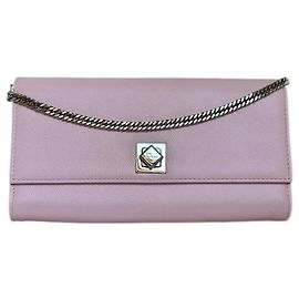 Christian Dior Pochette Wallet su sedia Dior Lady Dior rosa cipria