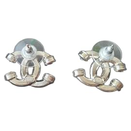 Orecchini Chanel argentati in metallo