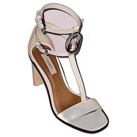 Décolleté Coach in pelle bianca