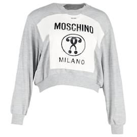 Maglione girocollo in cotone grigio con stampa Moschino