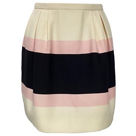 Valentino Garavani Falda mini plisada a rayas de crepé Valentino en lana crema