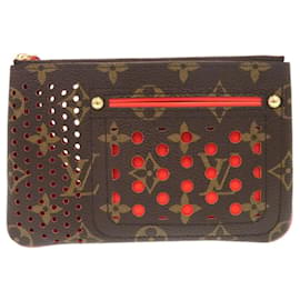Pochette perforata Monogram Louis Vuitton