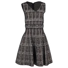 Vestido acampanado de cuadros a la altura de la rodilla en lana marrón de Prada