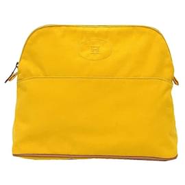 Pochette Bolide GM di Hermes in tela di cotone gialla - Hermès