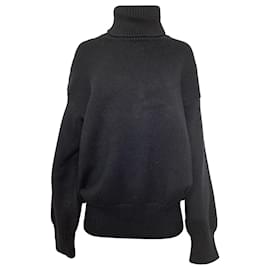 Der Rollkragenpullover aus schwarzer Merinowolle - The row