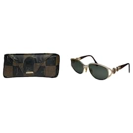 Occhiali da sole in metallo dorato Fendi