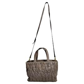 Borsa a mano in pelle matelassé viola Miu Miu