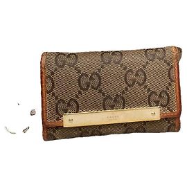 Gucci GG Blooms braune Lederhandtasche