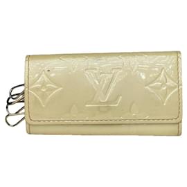 Porte-monnaie en cuir blanc Lockme de Louis Vuitton