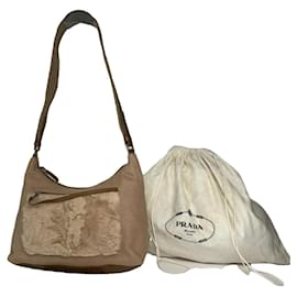 Borsa a mano in pelliccia beige Prada Cleo