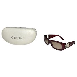 Gafas de sol de plástico moradas Gucci