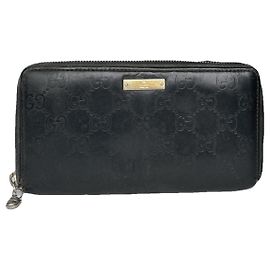 Portafoglio in pelle nera Gucci GG Blooms
