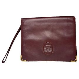 Clutch in pelle verniciata bordeaux Cartier C