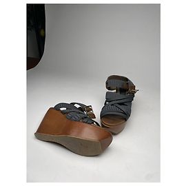 Mules y zuecos de cuero negro Marni