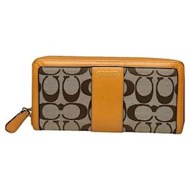 Portafoglio in pelle arancione Coach Cartable mini sierra