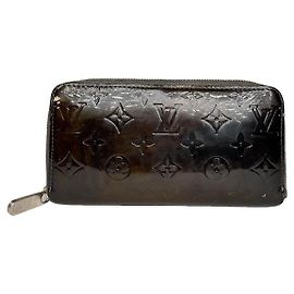 Louis Vuitton Ikat braune Lederbörse