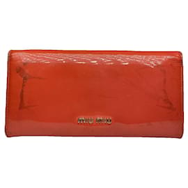 Portafoglio in pelle verniciata arancione Miu Miu