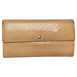 Louis Vuitton Metis Geldbörse aus gelbem Leder