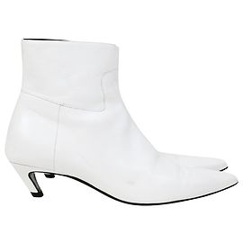 Botines de tacón inclinado Balenciaga en cuero blanco