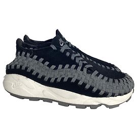 Tênis Nike Air Footscape Woven em pelo de pônei preto