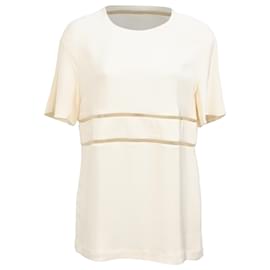 Top de crepé con corte de Alexander Wang en seda marfil