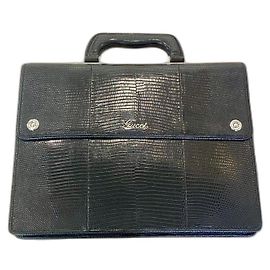 GUCCI Borsa uomo in pelle lucertola
