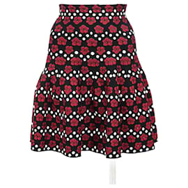 Falda mini estampada floral Alaïa en algodón negro