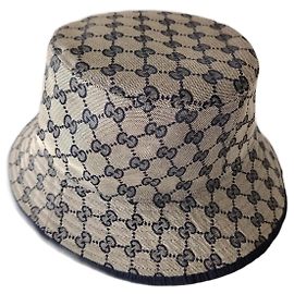 GUCCI CLOCHE IN TESSUTO GG.