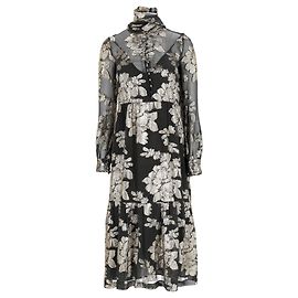 Vestido midi de seda negra con flores de Saint Laurent