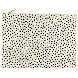 Clutch con zip a pois Saint Laurent in pelle bianca