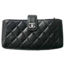 Cartera CC de CHANEL - O Mini negra acolchada con cremallera EN BUEN ESTADO