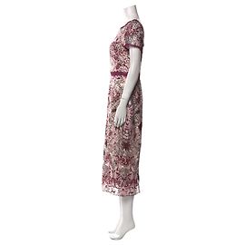 Abito Marchesa Notte in pizzo floreale rosa bordeaux nero