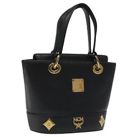 Borsa MCM in pelle nera e oro Auth yk17655