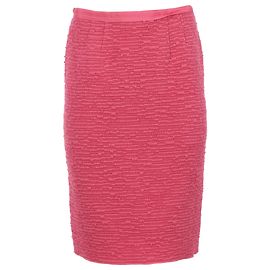 Falda lápiz texturizada hasta la rodilla en lana rosa de Nina Ricci
