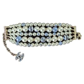 Chanel CC P19C Logo La Pausa Crociera Bracciale di Perle Striate scatola etichetta