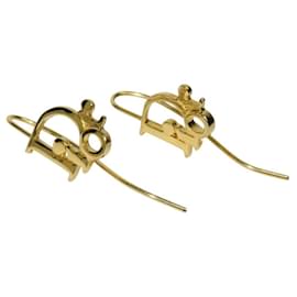 Goldene Creolenohrringe mit Christian Dior Logo