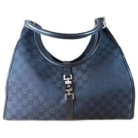 Borsa Gucci Jackie monogramma nera in pelle e tela