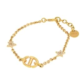 Bracciale in metallo dorato con pietra stella Christian Dior