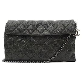 Bolso Chanel WOC de tela de purpurina y cuero negro