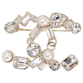 Spilla Chanel Doppia CC Metallo Champagne