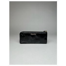 Cartera vintage de cuero patentado Miu Miu negra