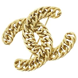 Spilla in catena placcata oro con marchio COCO di Chanel